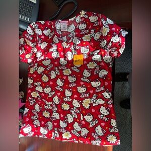 Size small scrub top